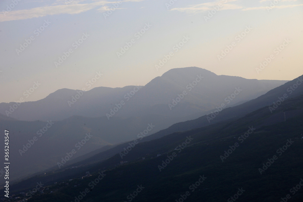 Silhouettes of the Crimean mountains in the evening light