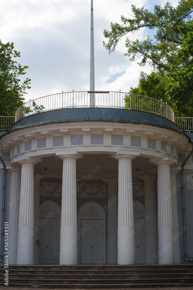 Blue Pavilion under the flag, decorated with a rotunda with white columns.