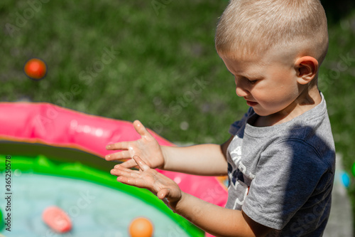 baby washes his hands