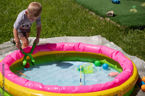 child play at the pool