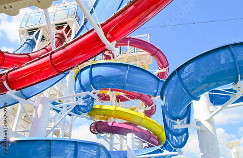 Modern aqua park with different speed waterslides on cruiseship or cruise ship liner for family fun photo