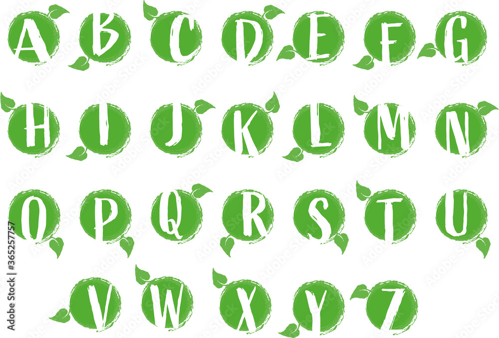 © Kolorowo.online - Green eco-friendly alfbet. Letters in circles with a leaf as a stamp.