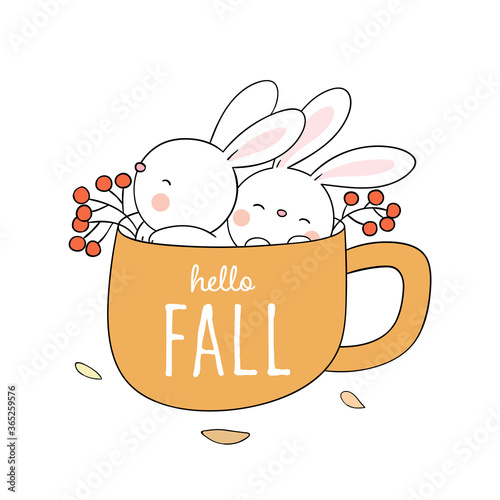 Draw cute rabbit in yellow cup of coffee for autumn.
