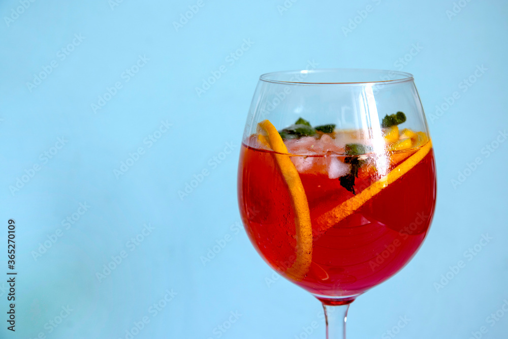 Refreshing summer cocktail with orange and ice Refreshing summer cocktail with orange and ice