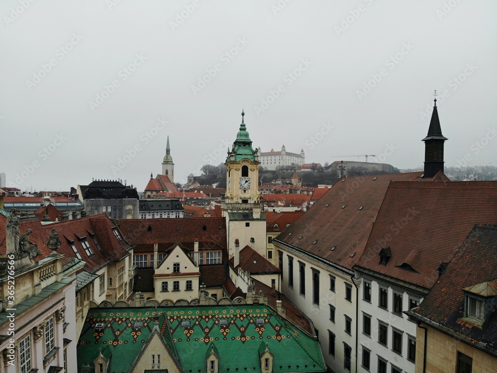 Slovakia, Bratislava. Historical old city centre. Aerial view from above, created by drone. Foggy day town landscape, travel photography.