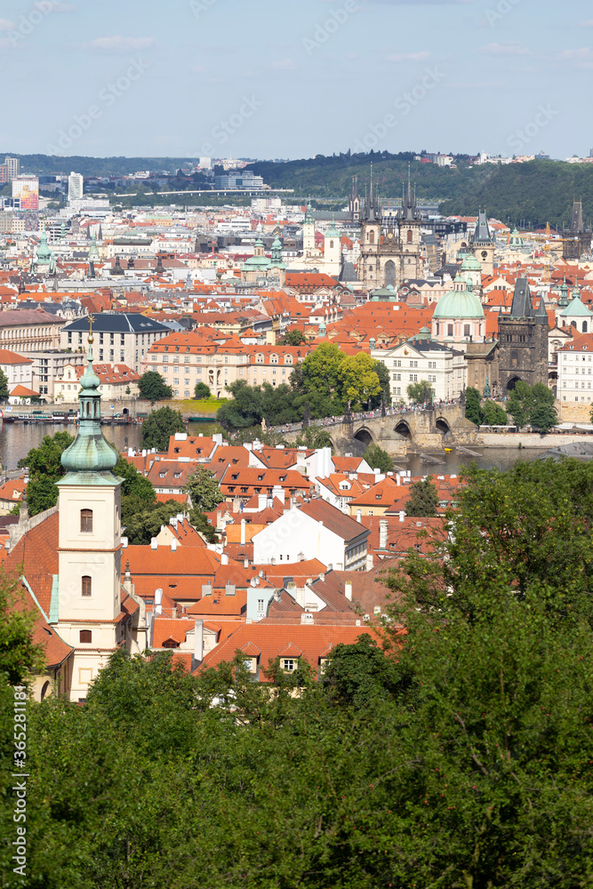 Prague City with Charles Bridge and green Nature from the Hill Petrin, Czech Republic