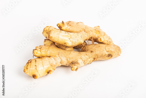 whole ginger on white background photo