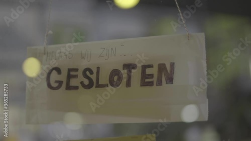 Gesloten / closed shop / winkel sign because of Corona photo