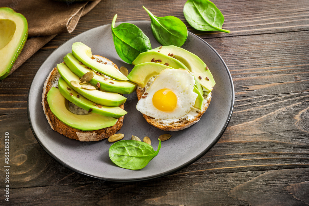 Avocado sandwiches with fried eggs