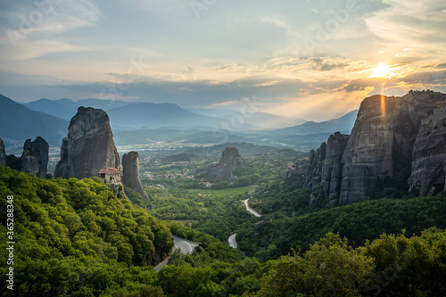 The Meteora monasteries with their scenic location on the rocks in Greece with sunset