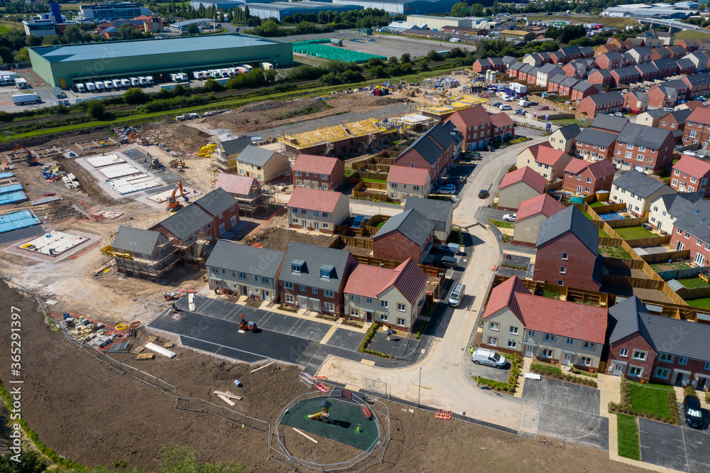 Aerial view of new houses being built / constructed by Taylet wimpy in Bridgwater, Somerset UK.