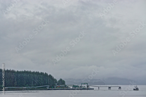 Hoonah, Alaska, USA: Unoccupied cruise ship docks at Icy Strait Point await visitors on a foggy summer morning.