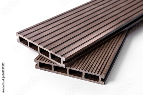wpc terrace - wood plastic composite decking boards isolated on white background photo