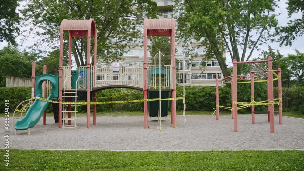 A playground closed, taped off because of COVID 19 A playground closed, taped off because of COVID 19