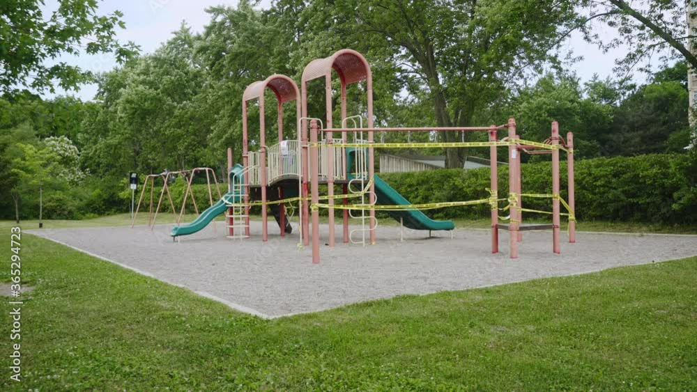 A playground closed, taped off because of COVID 19 A playground closed, taped off because of COVID 19