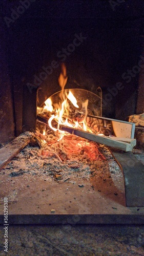 Fire fireplace at home , Italy