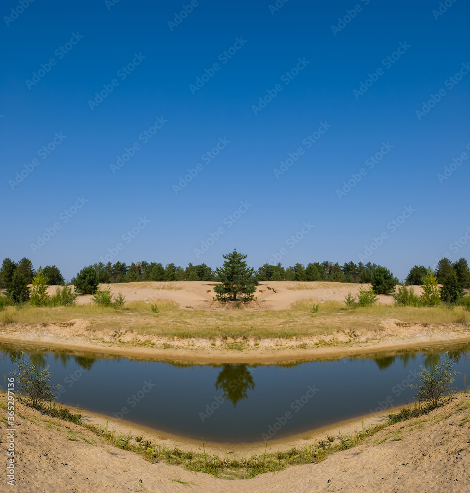 Fototapeta premium small lake among a sandy dunes, summer desert oasis scene