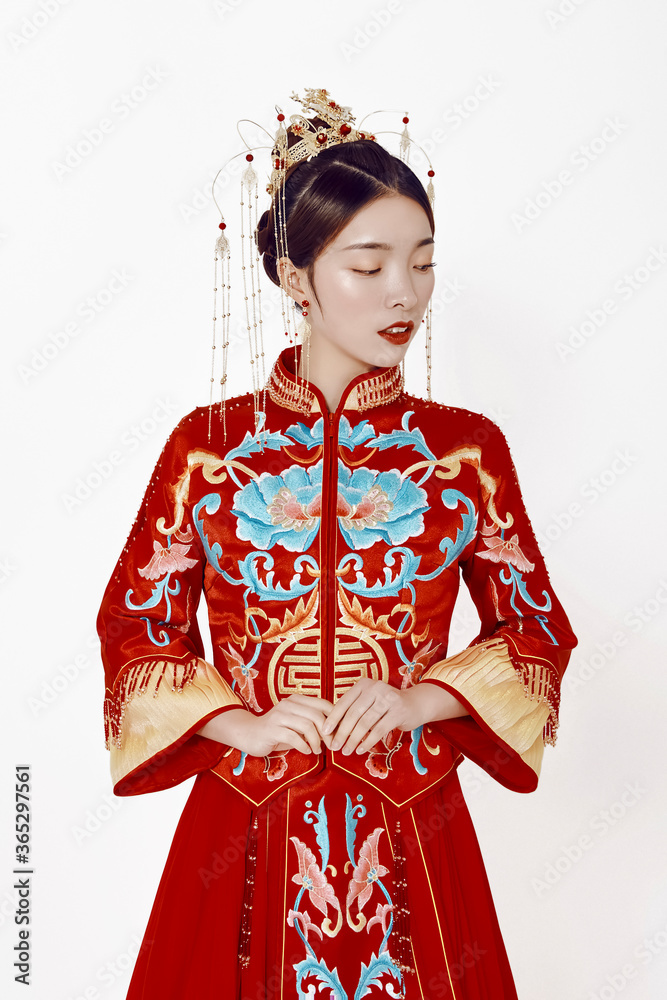 Girl wearing Asian costume in white background Girl wearing Asian costume in white background