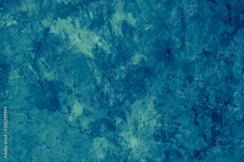 Abstract blurred and grunge deep blue stucco textured background for navy blue backdrop and wallpaper