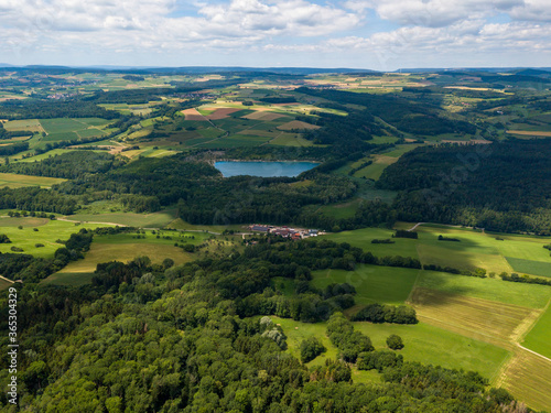 Aerial view on the lake Binningen in Hegau from the Hegau volcanic cone Hohenstoffeln, Germany.