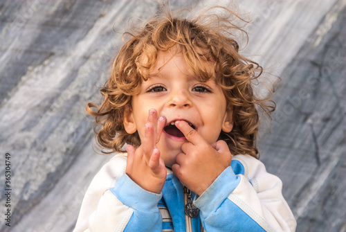 portrait of a little boy on a marble background