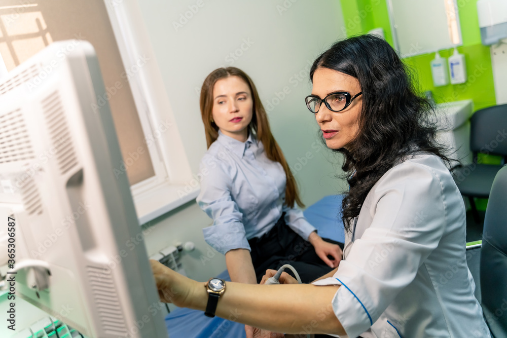 Obraz premium Doctor and patient. Ultrasound equipment. Diagnostics. Sonography.