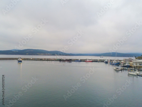 Aerial view in Camarinas. Galicia. Coastal town with boats in Spain