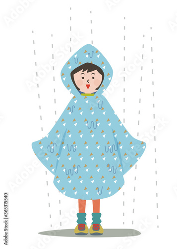 雨に打たれてビショビショになるポンチョを来た女性
