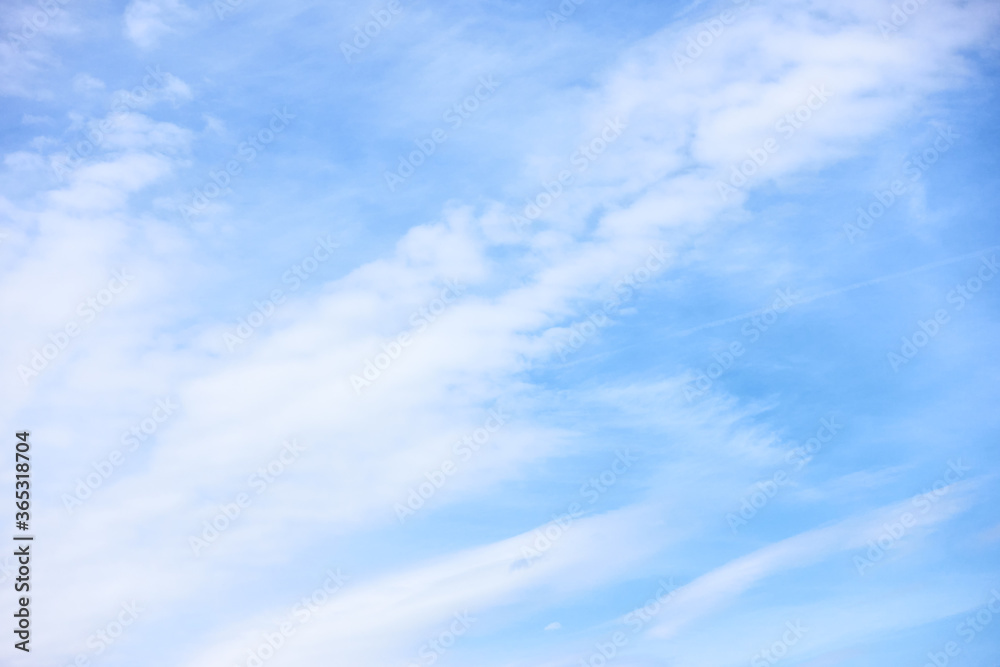 Blue sky with light clouds - abstract background