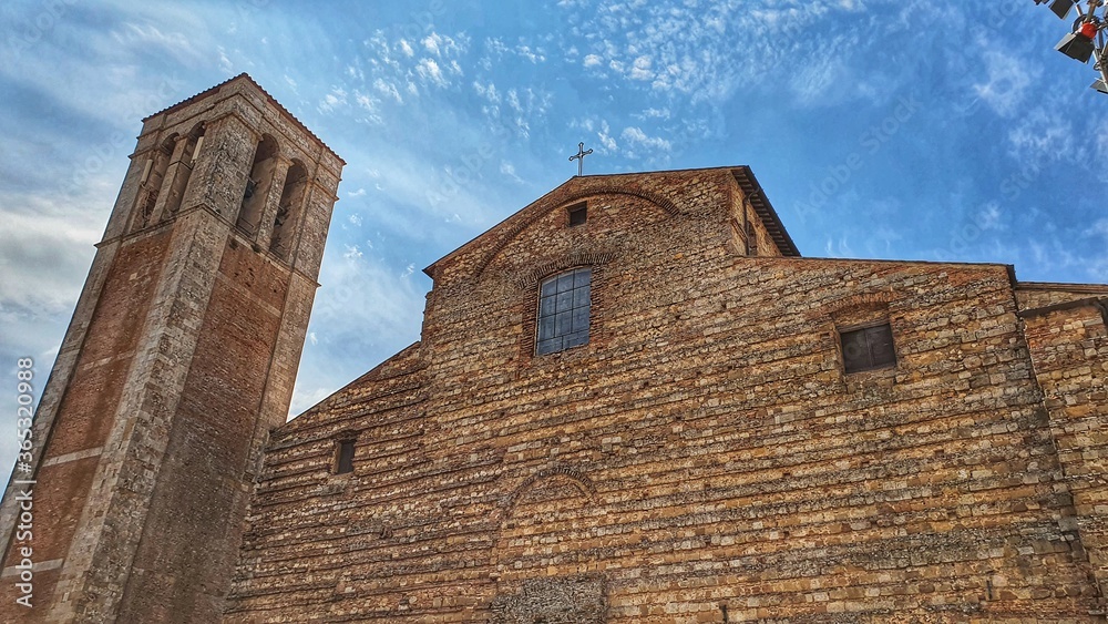 Montepulciano, Tuscany, Italy - July 15 2020: Facade of the Cathedral of Santa Maria Assunta in Montepulciano.