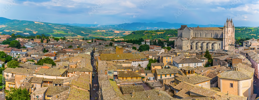 The panorama view across the roof tops and cathedral in Orvieto, Italy in summer
