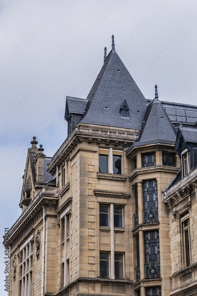 Architectural fragments of Vincennes Hotel de Ville (1887 - 1891) or Town hall of Vincennes. Vincennes - a commune in the Val-de-Marne department in the eastern suburbs of Paris, France.