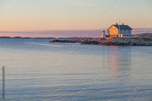 A beautiful sunset over the sea and a lighthouse on the the Swedish west coast, Sweden 