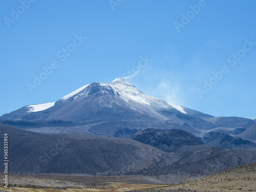 Signs of the activity of Guallatiri volcano in the Altiplano in the north of Chile. photo