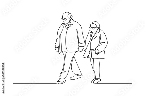 Elderly couple in continuous line art drawing style. Senior man and woman walking together holding hands. Minimalist black linear sketch isolated on white background. Vector illustration
