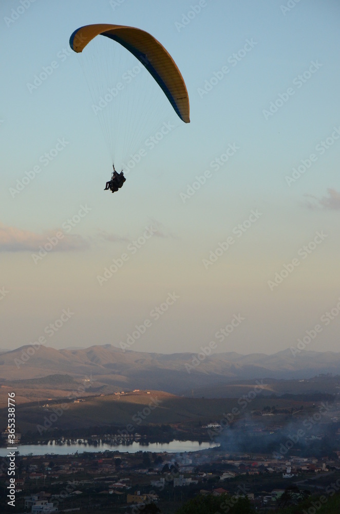 Paragliding at sun set in Topo do Mundo (translated to Top of the World) in Minas Gerais Paragliding at sun set in Topo do Mundo (translated to Top of the World) in Minas Gerais