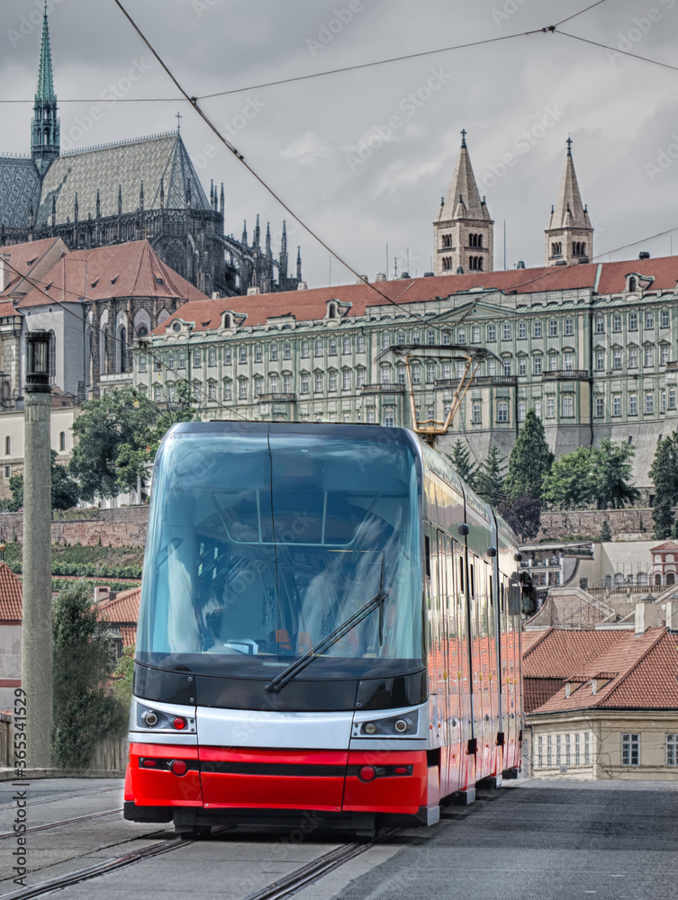 Obraz premium New tram in the city on the bridge.
