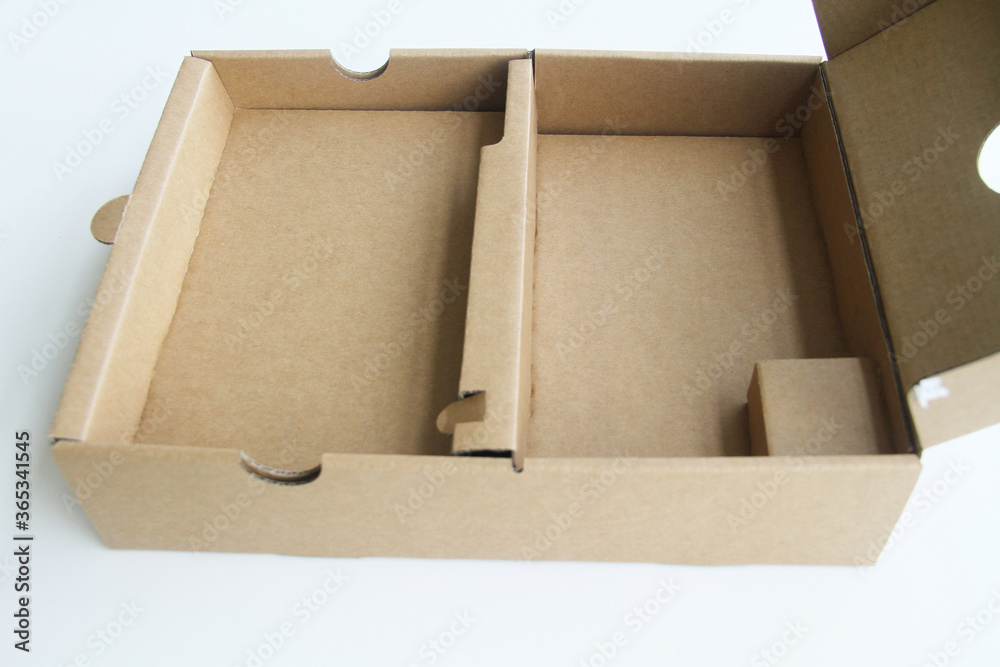 Isolated open cardboard box packing  in white background, Sao Paulo, Brazil