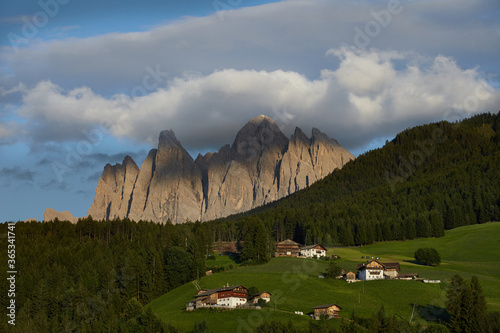 Odle muntains with clouds from Funes valley photo