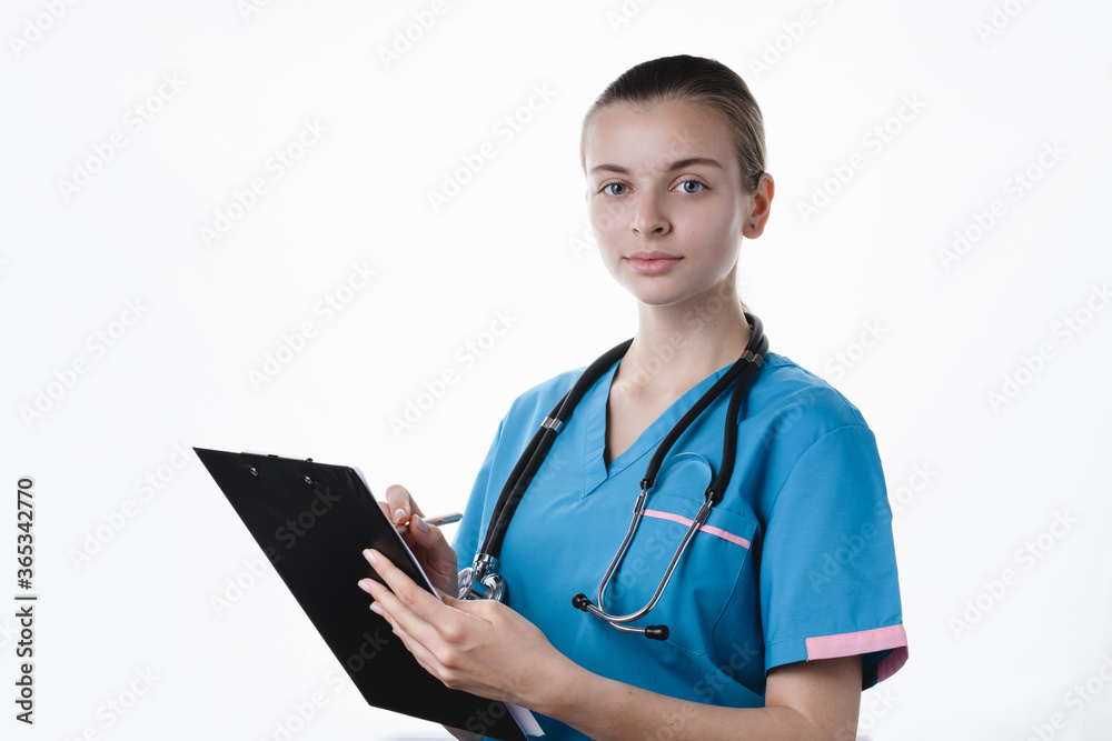 Girl doctor makes a medical examination on a white background Girl doctor makes a medical examination on a white background