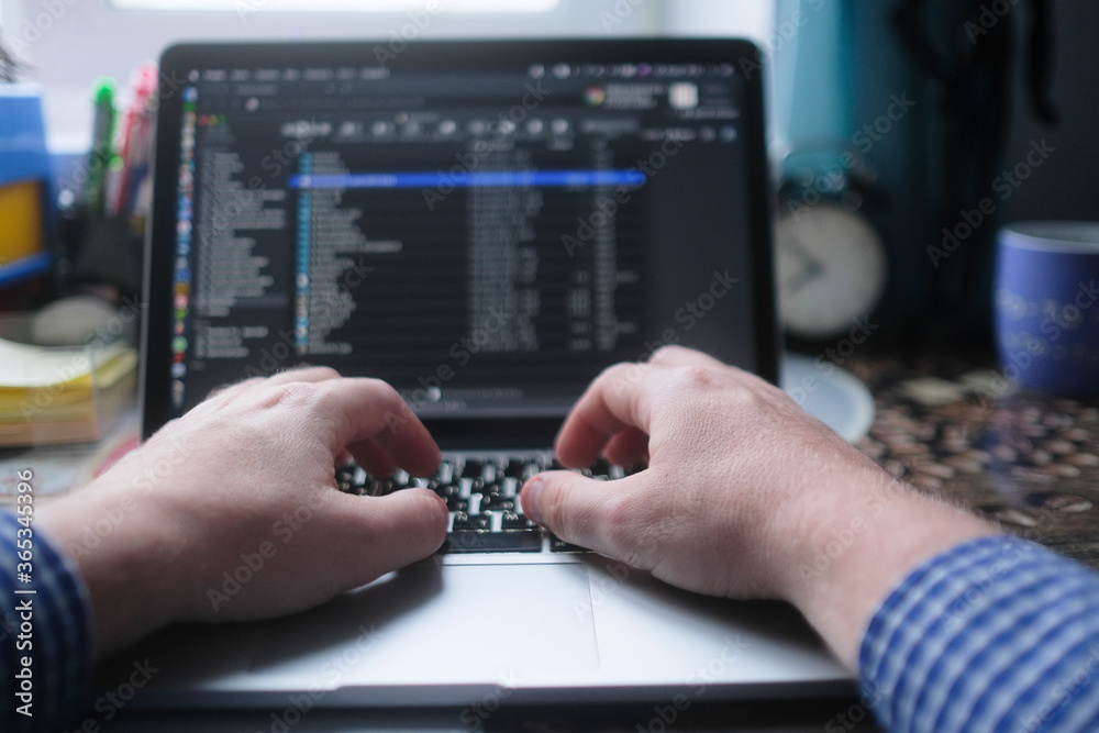 image of male hands on laptop keyboard image of male hands on laptop keyboard