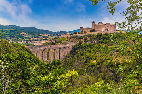 A view of the Tower Bridge and the hill top fortress in Spoleto, Italy in summer