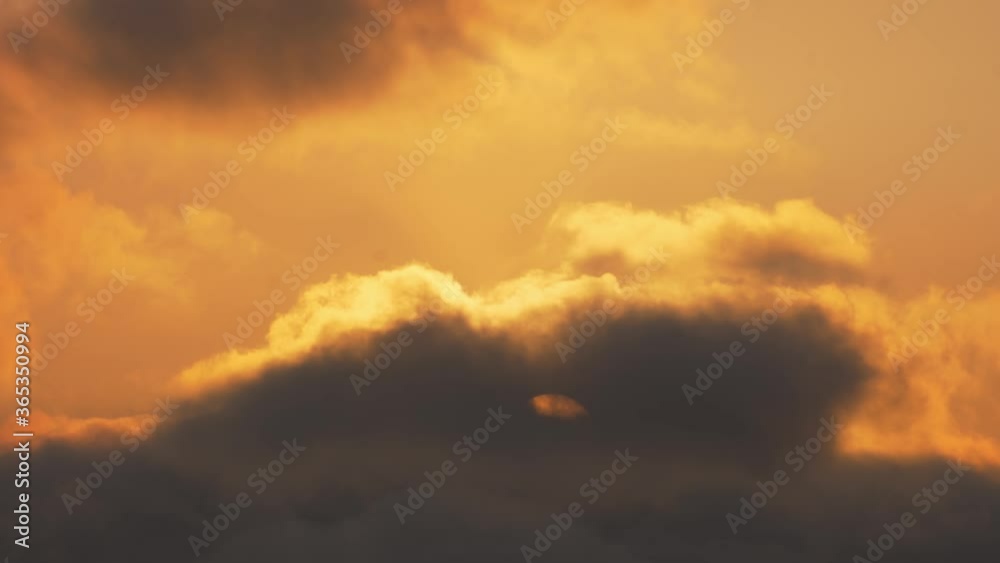 Dark Cloud at Sunset with Orange Sky, Extreme Close Up Dark Cloud at Sunset with Orange Sky, Extreme Close Up
