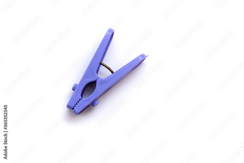clothespin purple. isolated white background clothespin purple. isolated white background