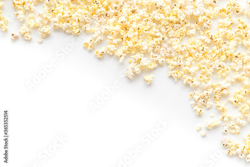 Popcorn frame on white background top view copy space