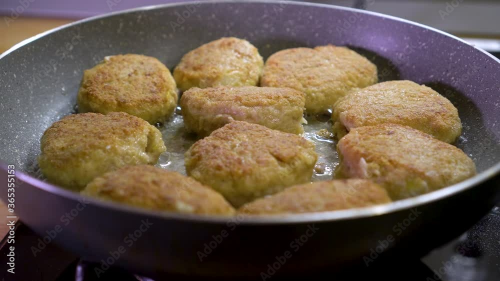 Frying fresh delicious meat balls on a hot pan Frying fresh delicious meat balls on a hot pan