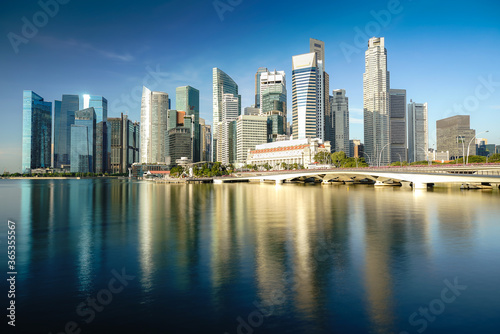 Singapore business district skyline financial downtown building with tourist sightseeing in morning at Marina Bay  Singapore. Asian tourism  modern city life  or business finance and economy concept