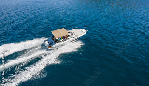 Speed boat in beautiful mediterranean sea, aerial view