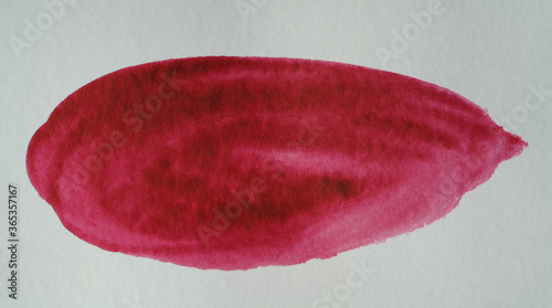 watercolor red rounded brush stroke stain on paper background with texture