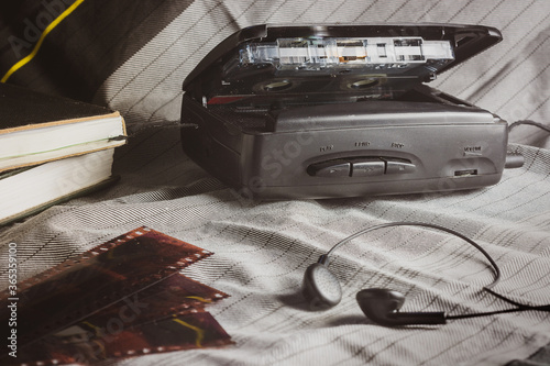 Tableau sur toile Opened vintage walkman and photography films